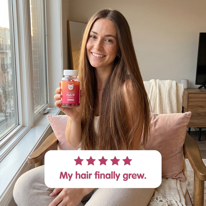 Happy customer holding EVURA jar with five-star review: My hair finally grew